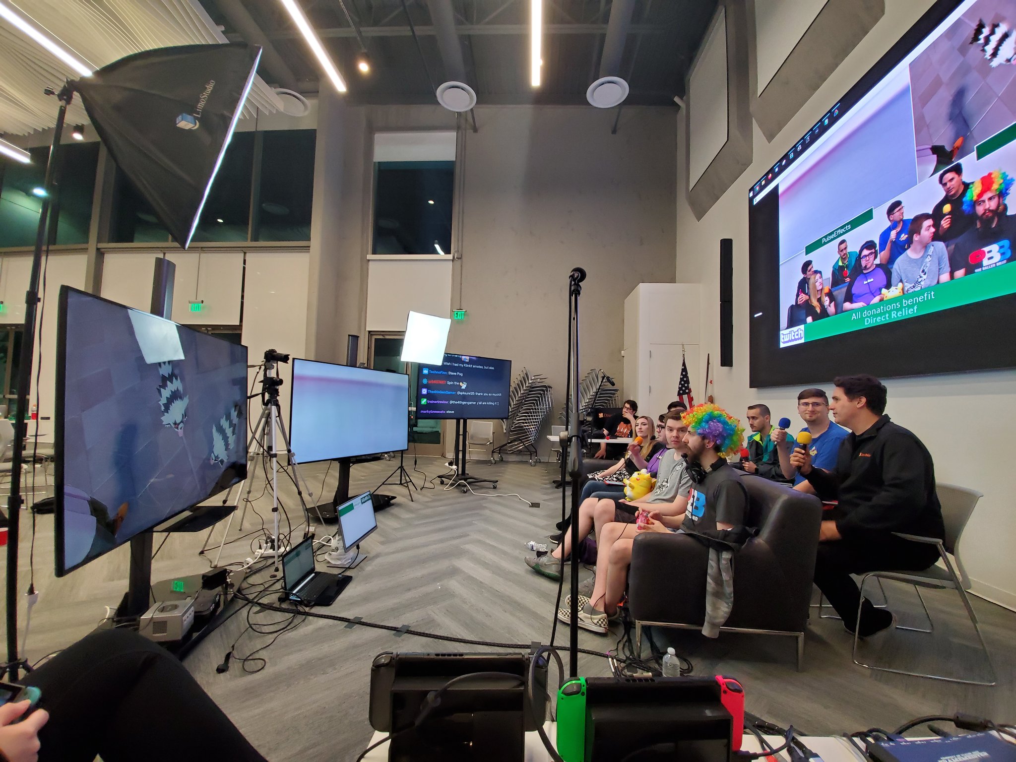 Side-angle showing the couch and the game screens